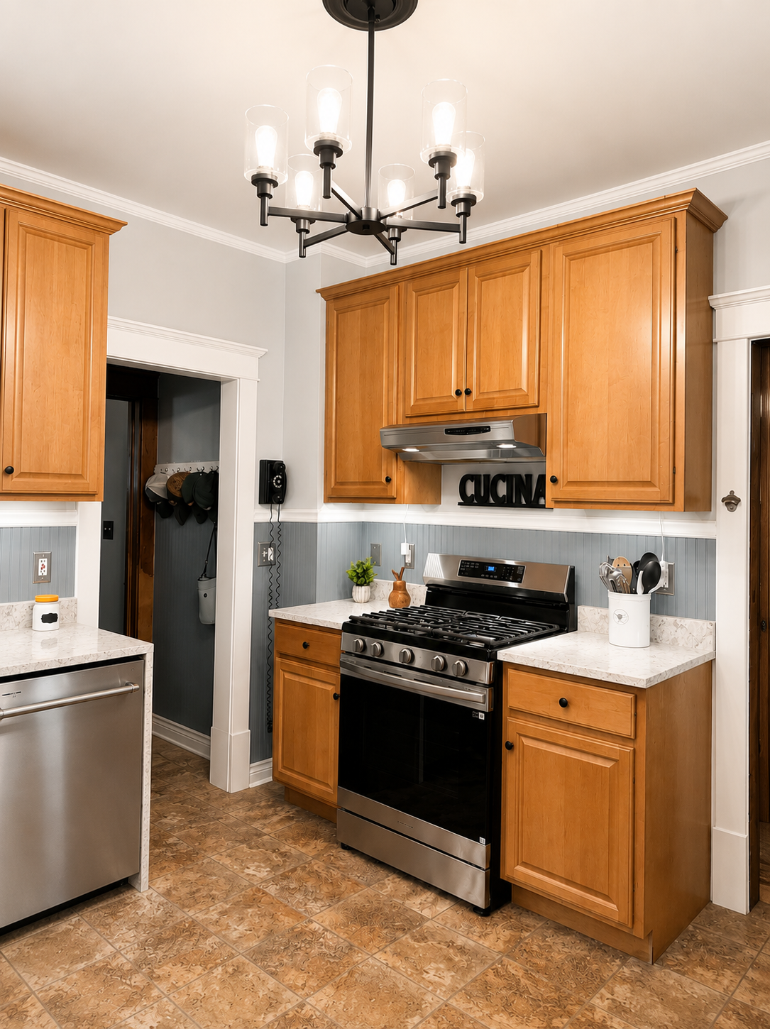 42" maple upper cabinets, Silestone, & 5 burner gas stove