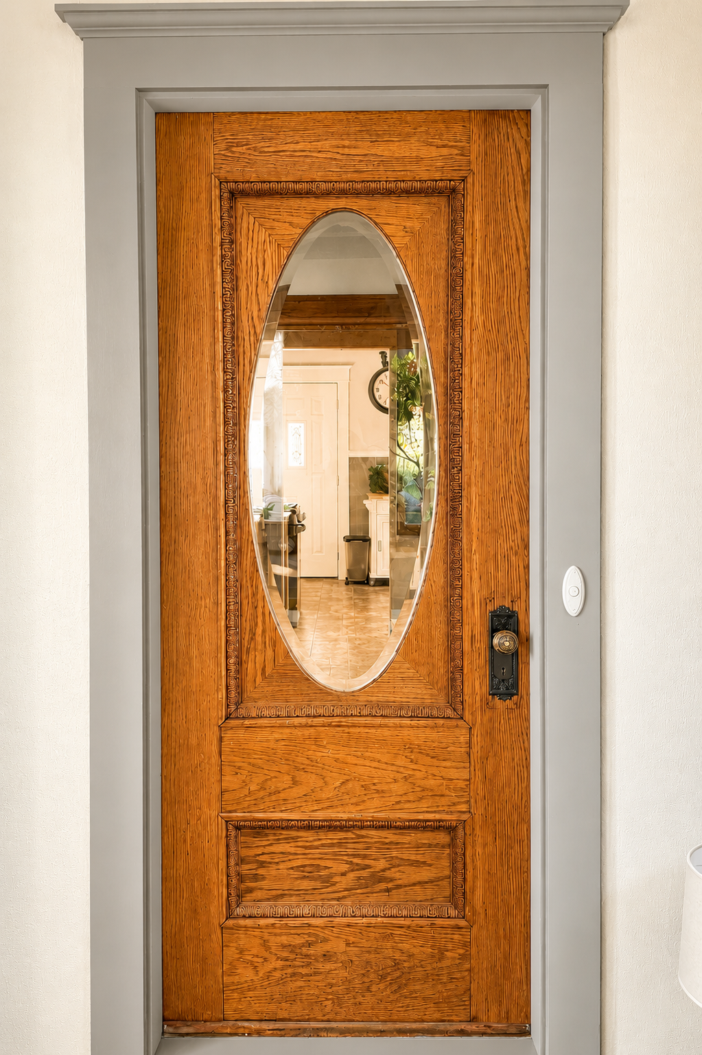 Beautiful original leaded glass details preserve the homes historic charm