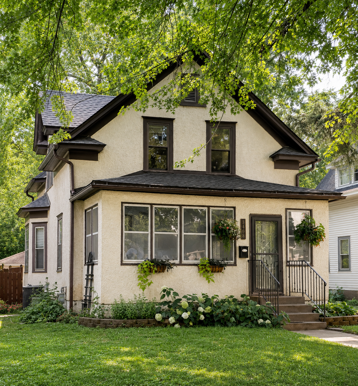 Classic 1912 stucco with mature trees & perennial gardens