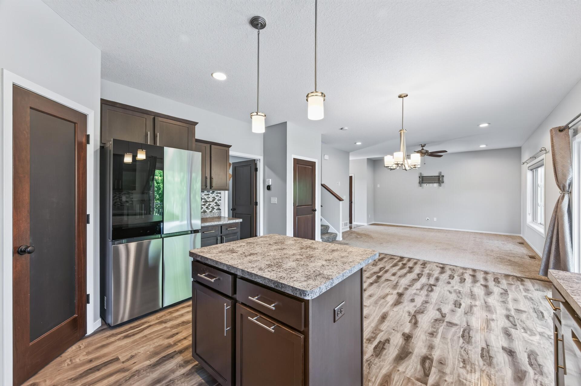 Main level kitchen, dining area and living room