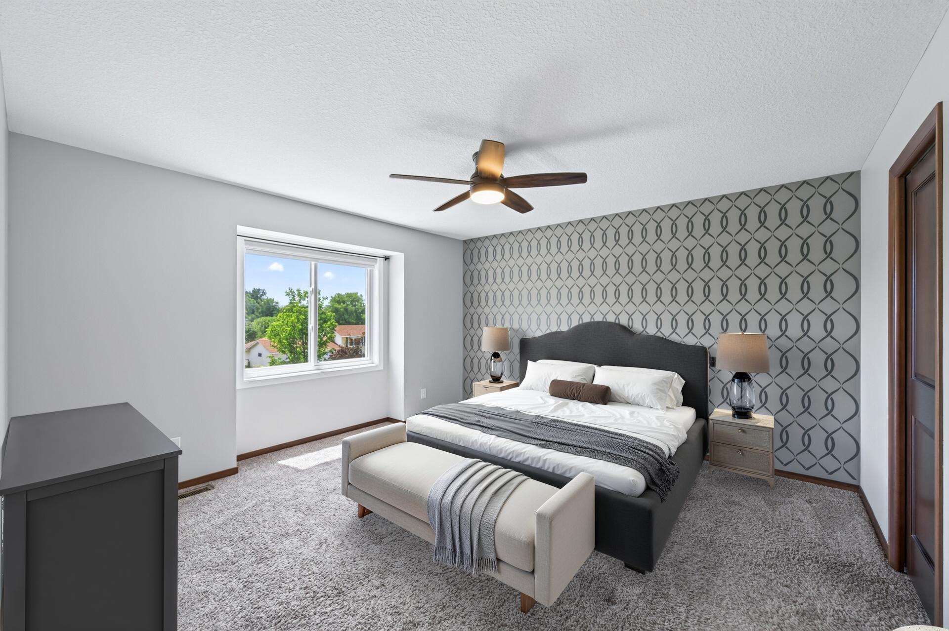 Upper level primary bedroom - virtually staged