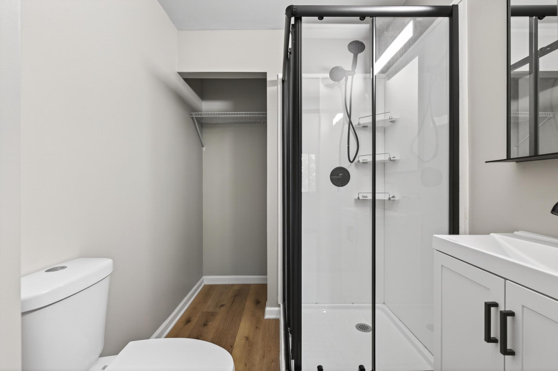 Newly added 3/4 bath featuring a walk-in shower and modern finishes.