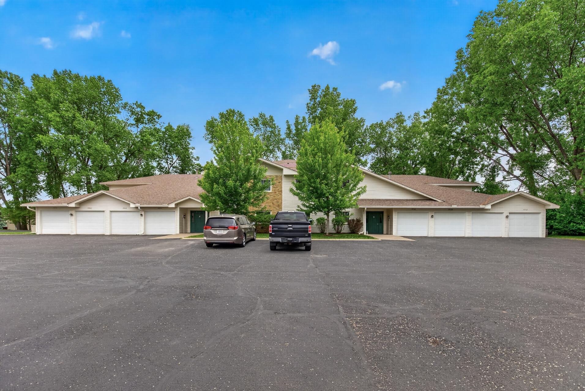 Completely renovated townhome in a peaceful setting with mature trees.