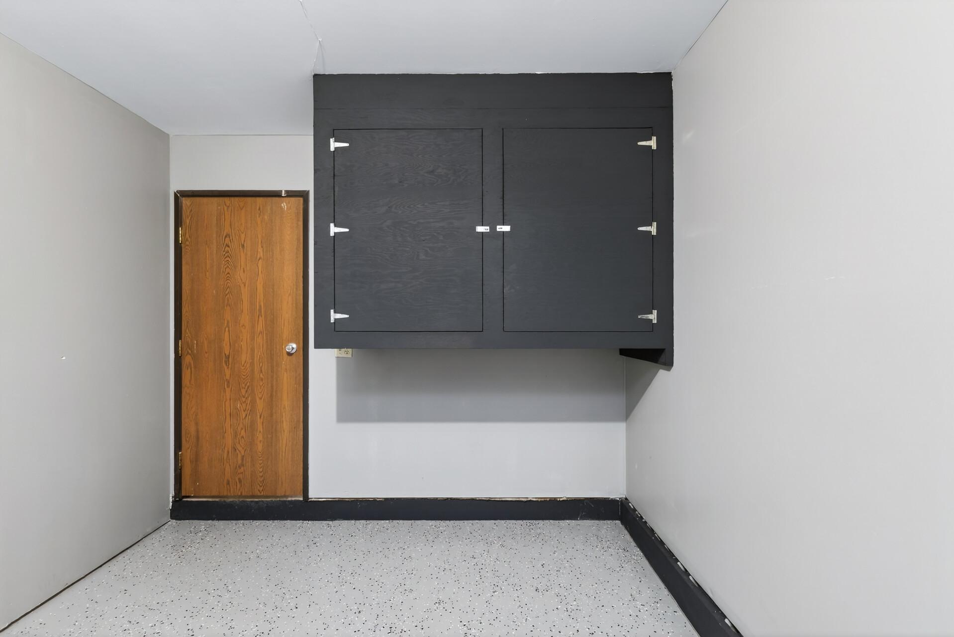 Built-in garage storage provides extra space for tools and seasonal items.