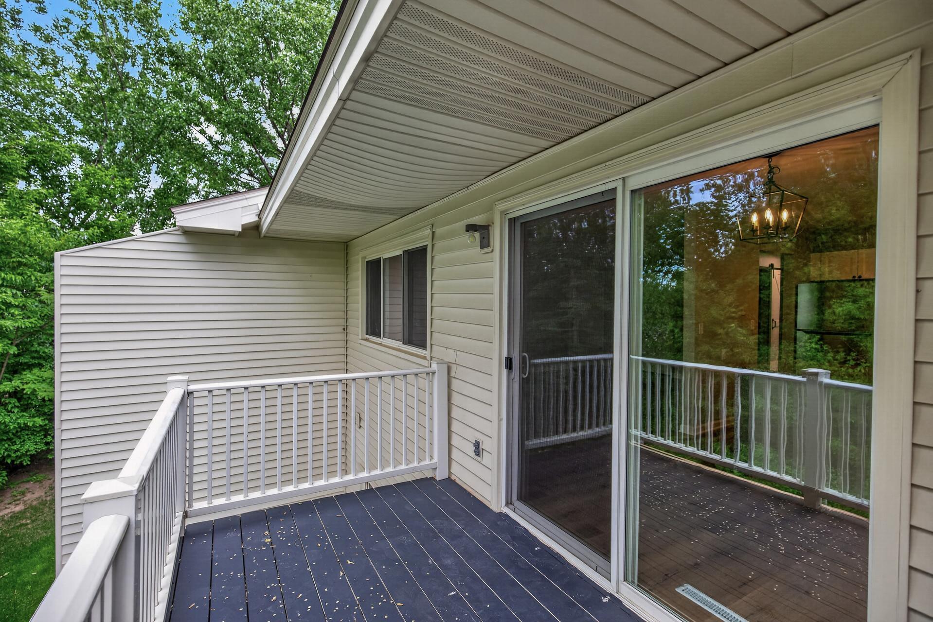Easy indoor-outdoor living with direct deck access from the main living area.