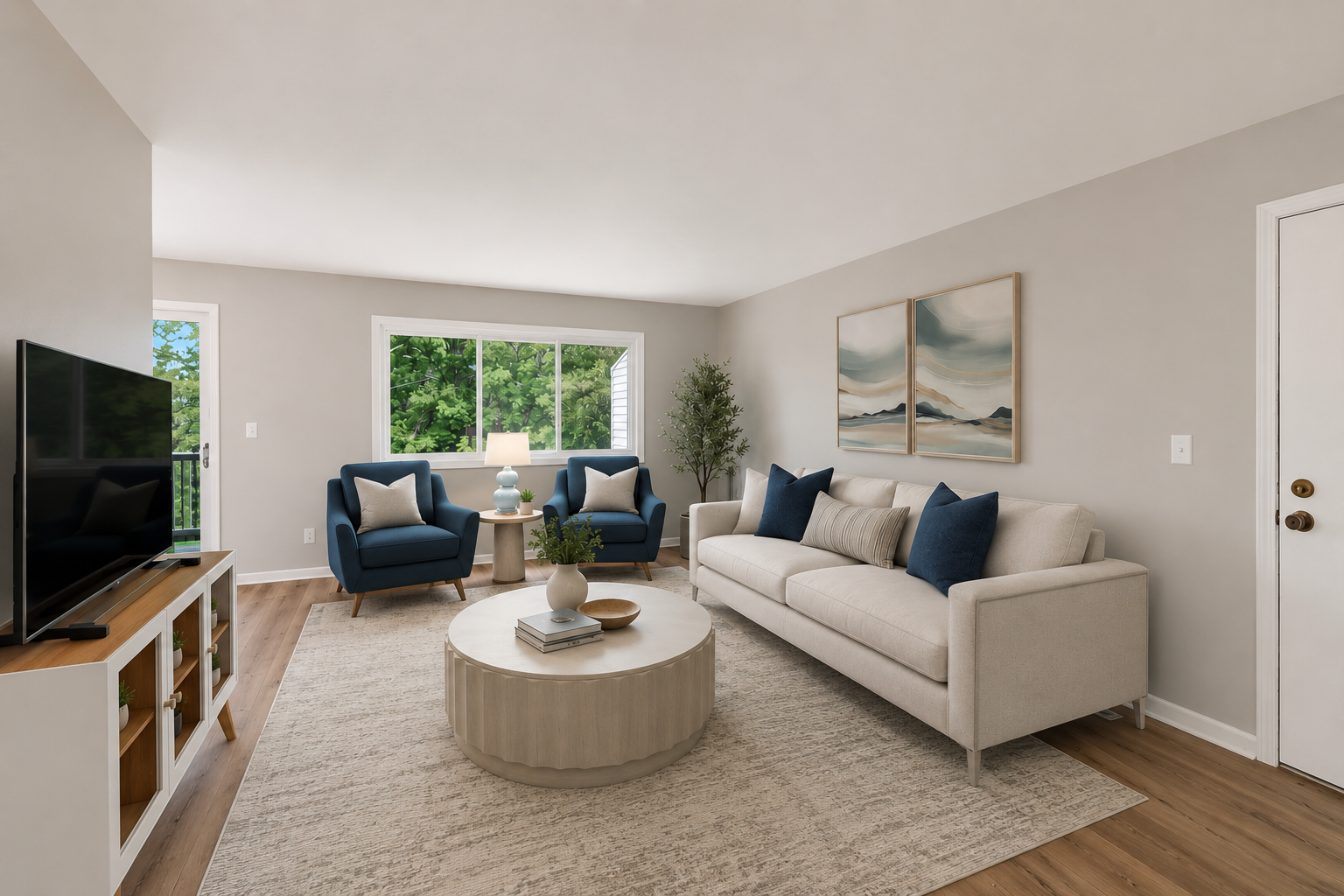 Bright and welcoming living room with updated flooring, a large picture window, and a functional open layout. (Virtually staged)