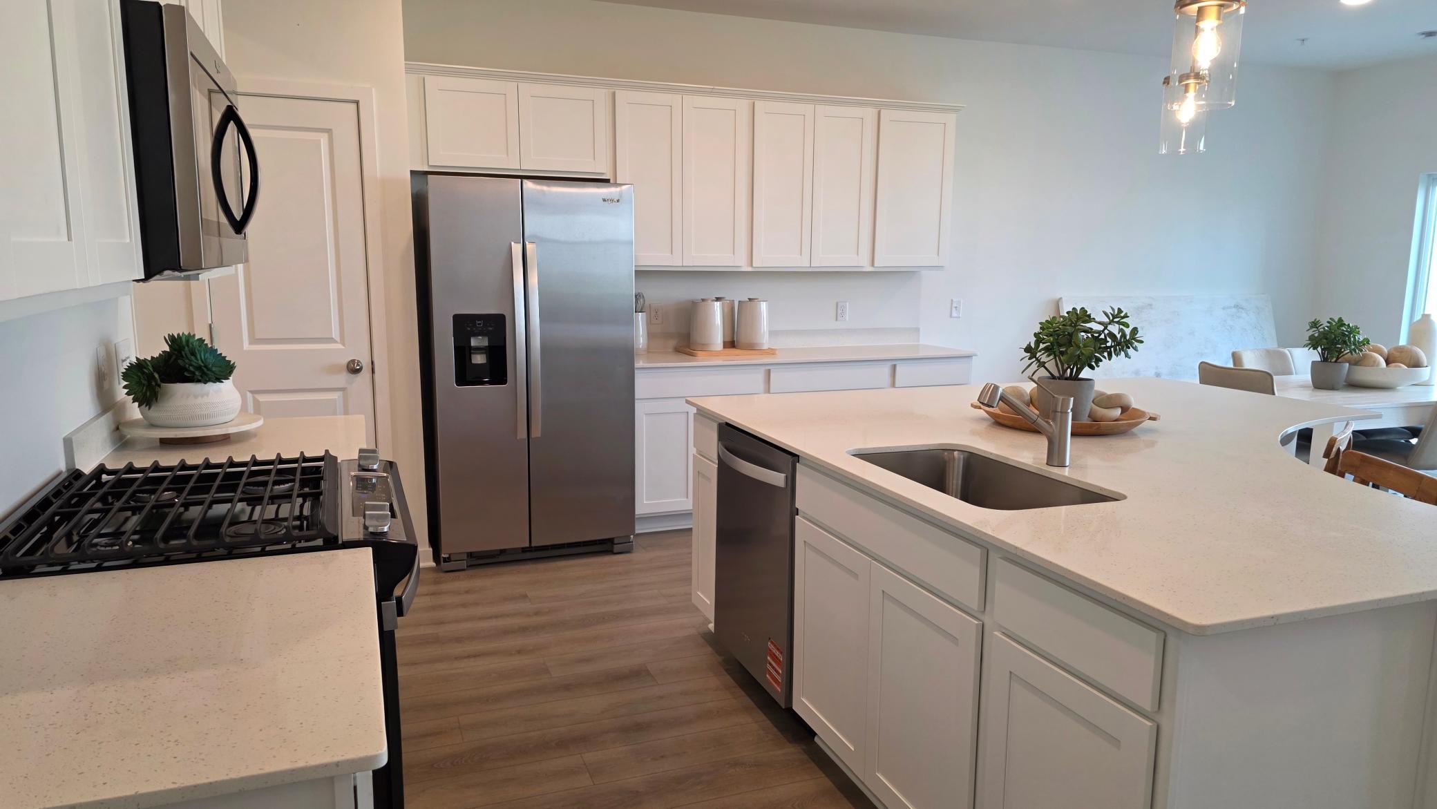 Kitchen with abundant cabinet and counter space (Actual home - furniture not included)