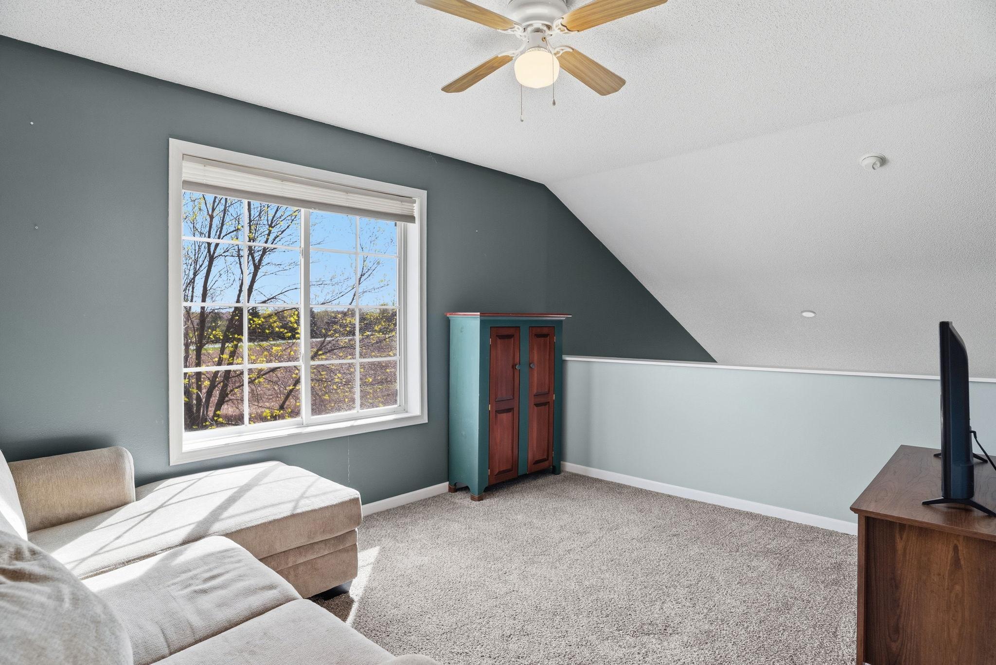Loft space is perfect for a home office or homework nook!