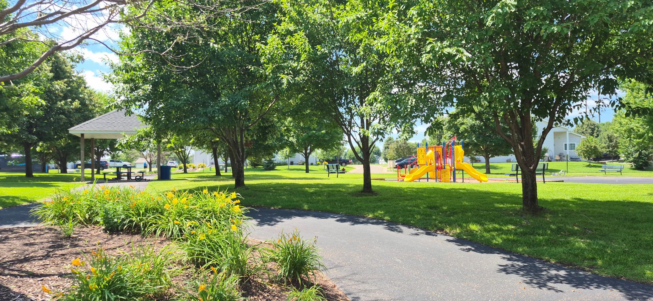 Walking trails a park and sport court around the corner!
