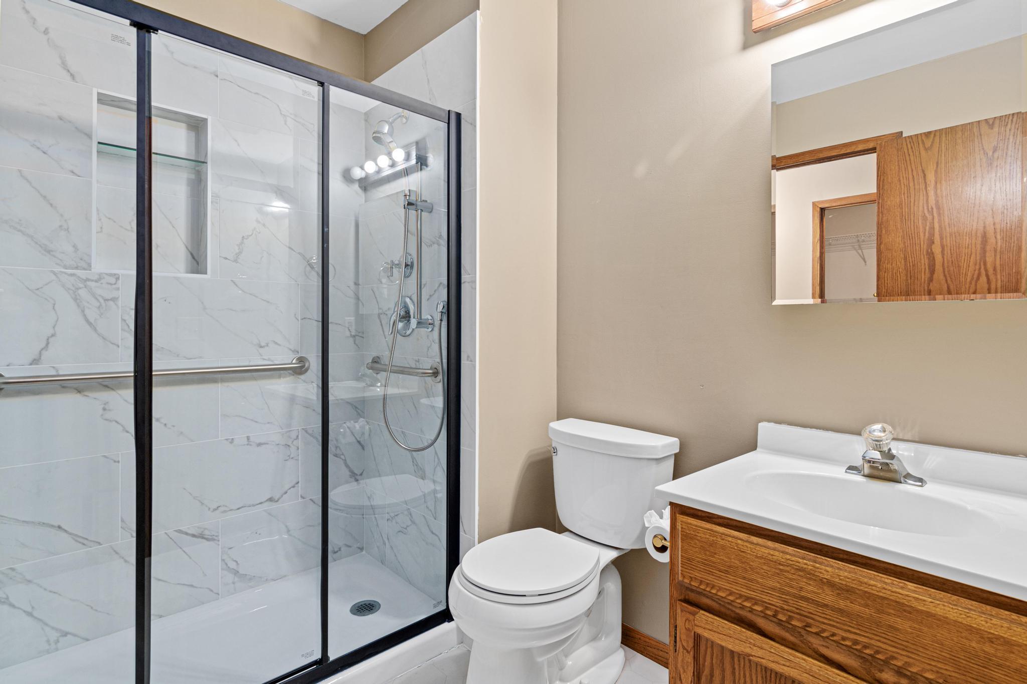 Updated main floor bath with walk-in shower.