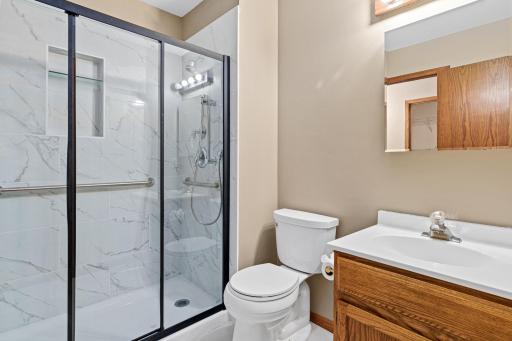 Updated main floor bath with walk-in shower.