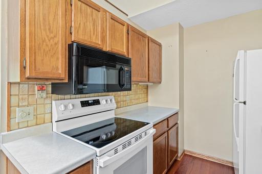 New stove nestled in between ample counter space for ease of cooking.