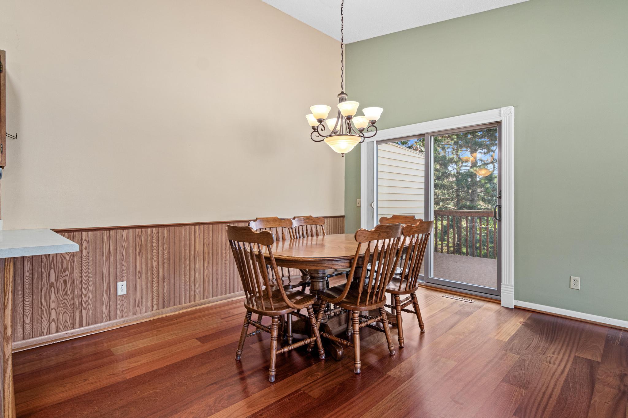 The dining area can host a larger table and has convenient access to the deck.