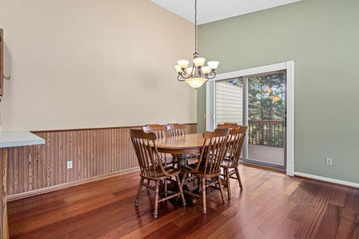 The dining area can host a larger table and has convenient access to the deck.