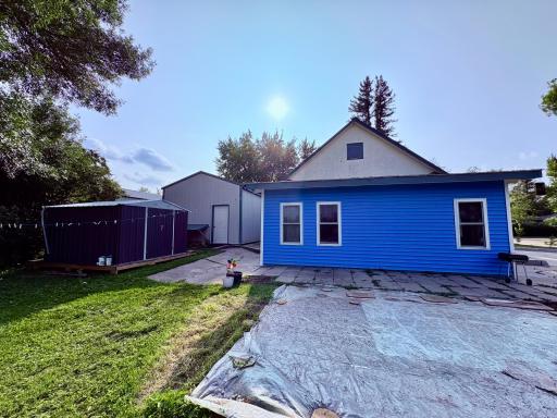 Rear of home/garage with shed