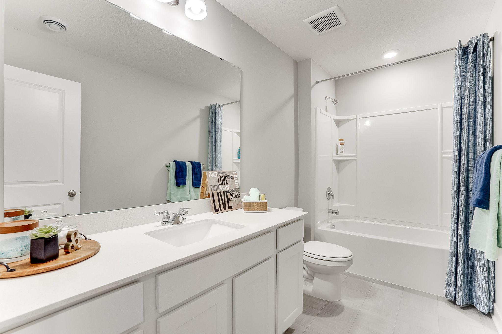The Main bath serves all bedrooms on the upper level