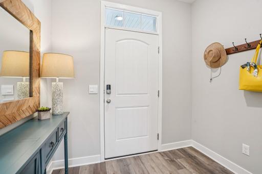 Welcome your guests into your home in this exceptional foyer. Photo of model home, colors and finishes may vary.