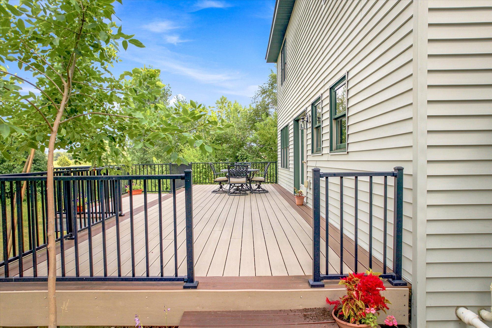 Dining Area Leads to Large Maintenance Free Deck