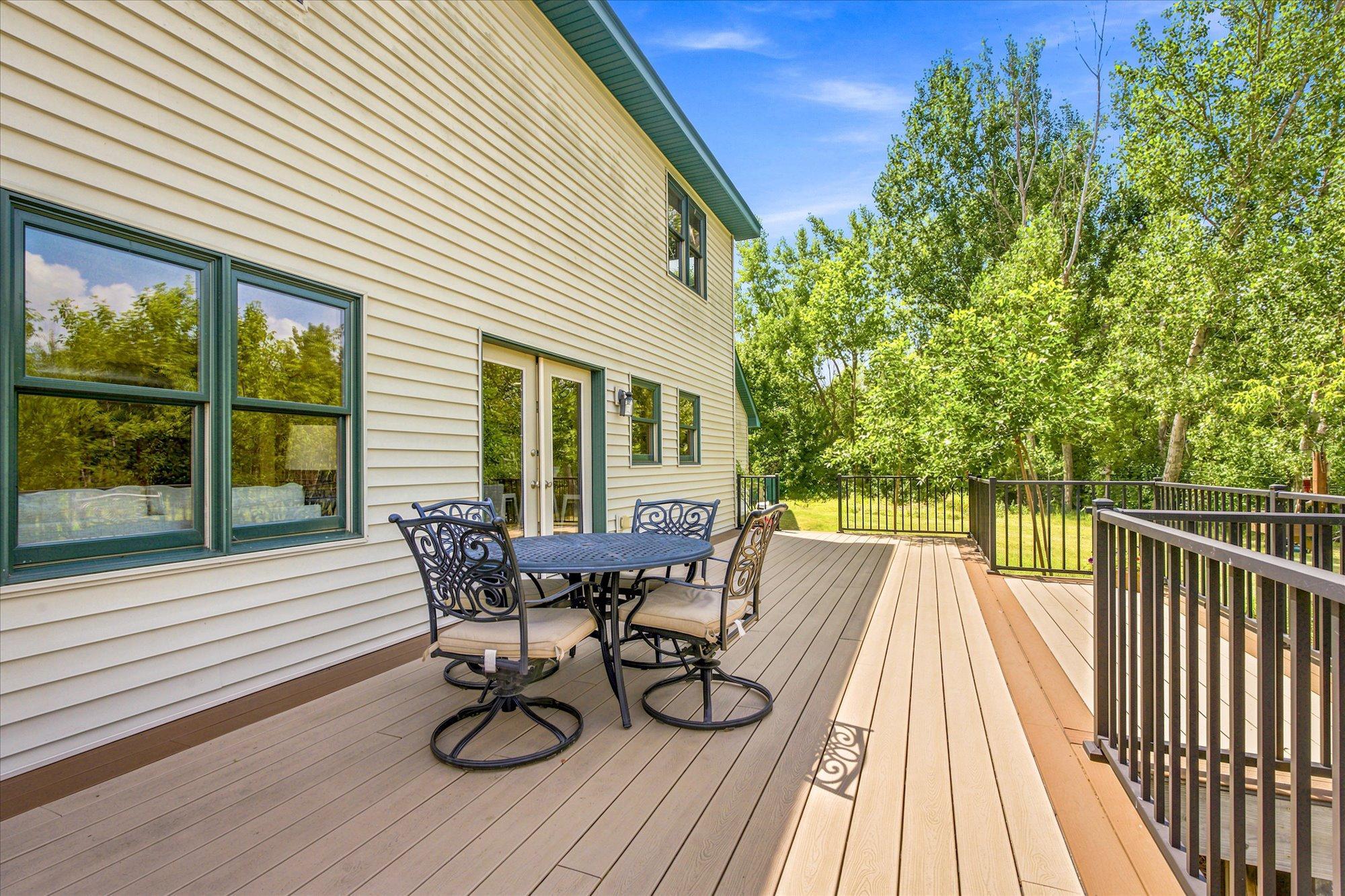 Deck leads to back yard
