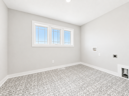 Upper level laundry that connects to the primary closet