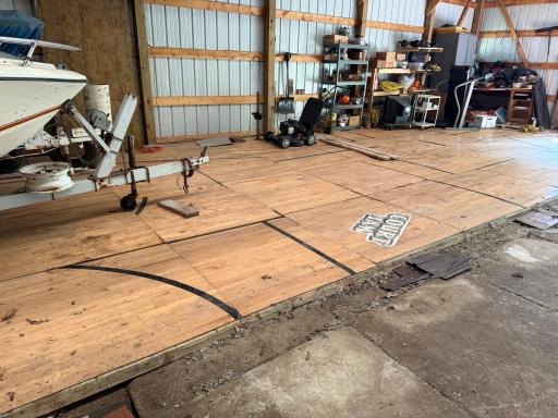 recycled basket ball court floor on half the pole barn