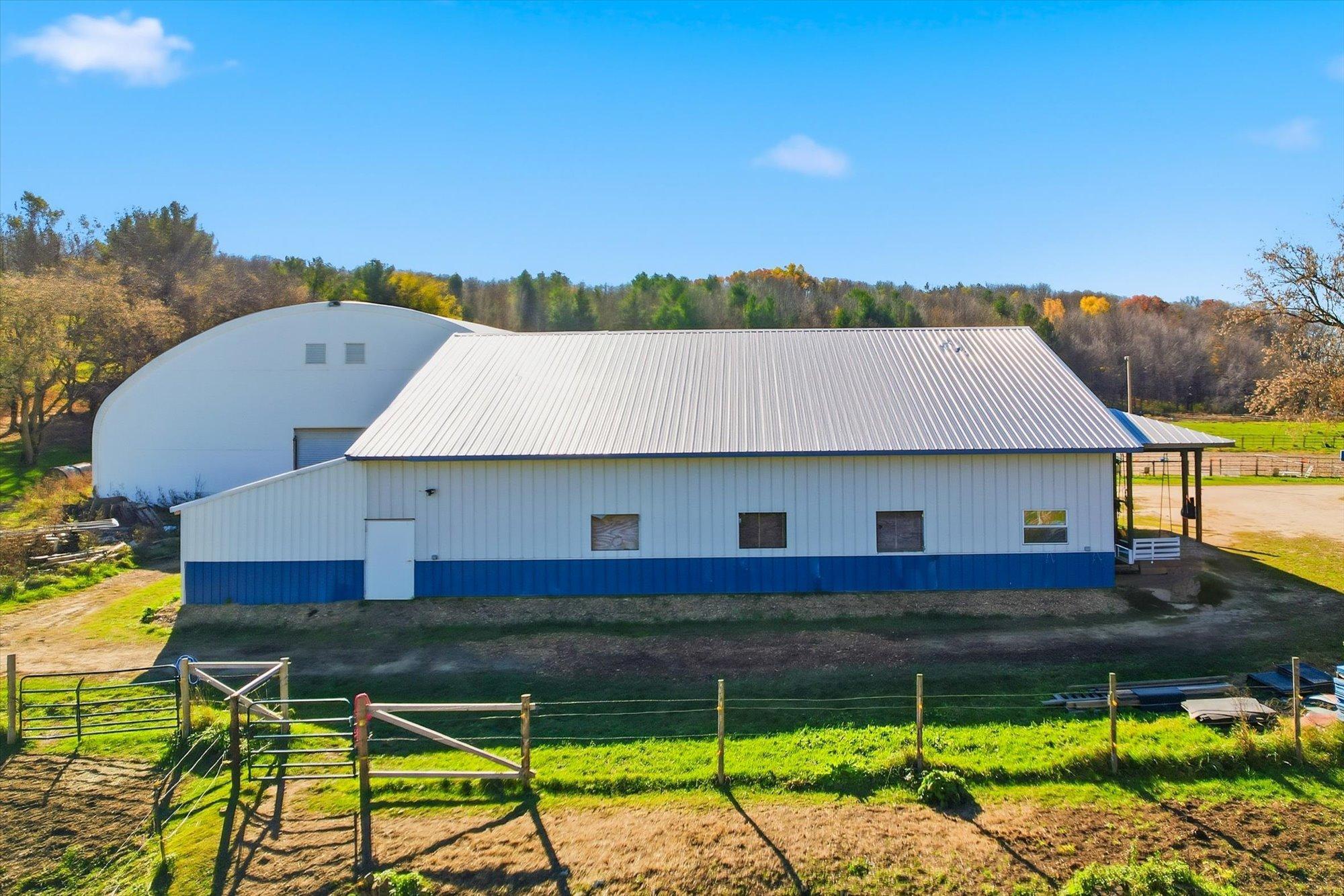Metal Barn with Windows in Stalls