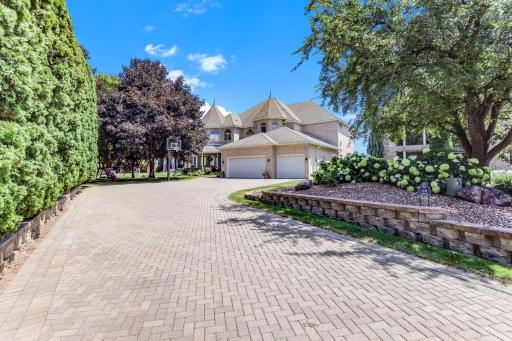 Located at the end of a cul de sac. Cobblestone driveway and walkways.