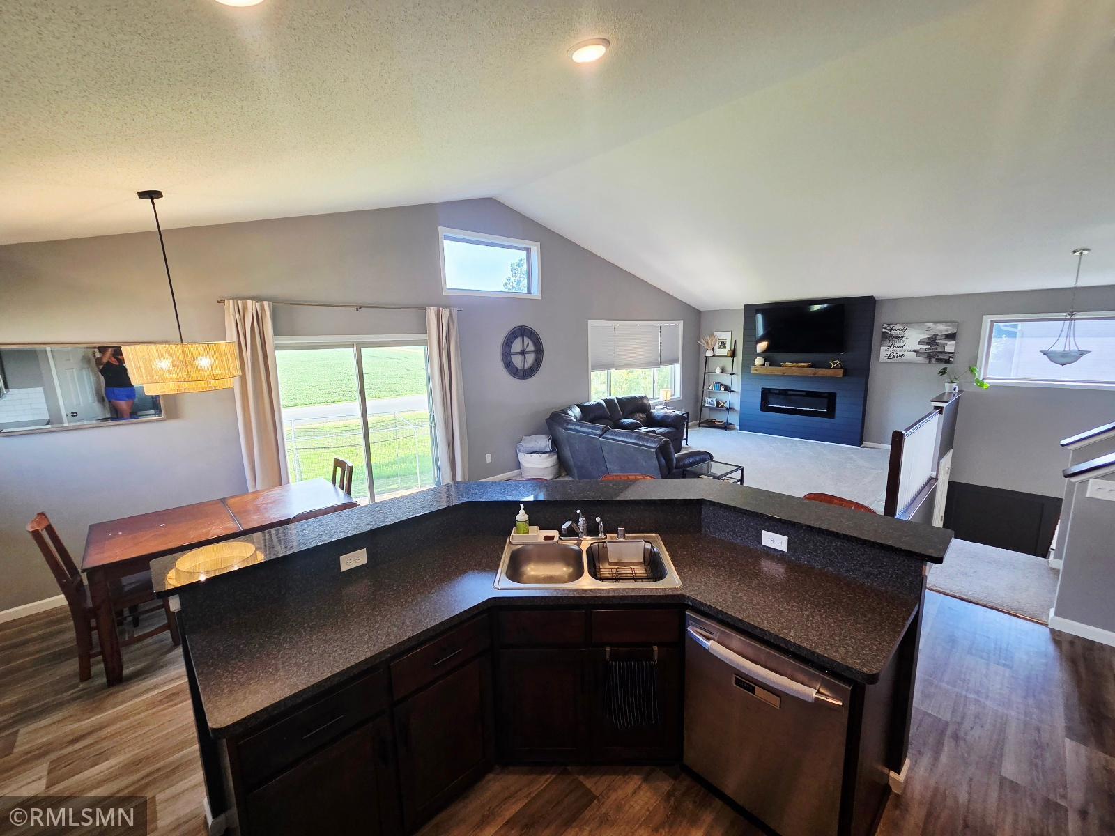 Kitchen features granite countertops