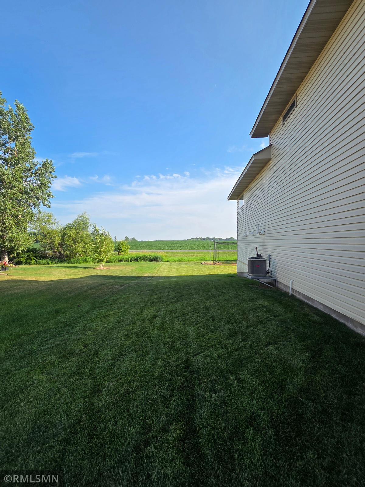 Yard featuring irrigation system