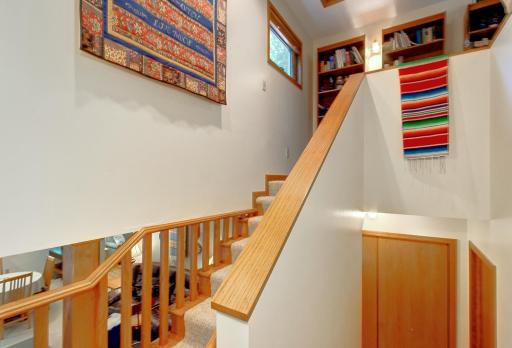 Open stairway connects to loft/bonus room