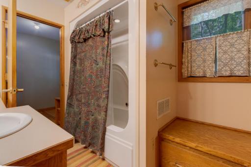 Laundry chute and linen storage is in window seat