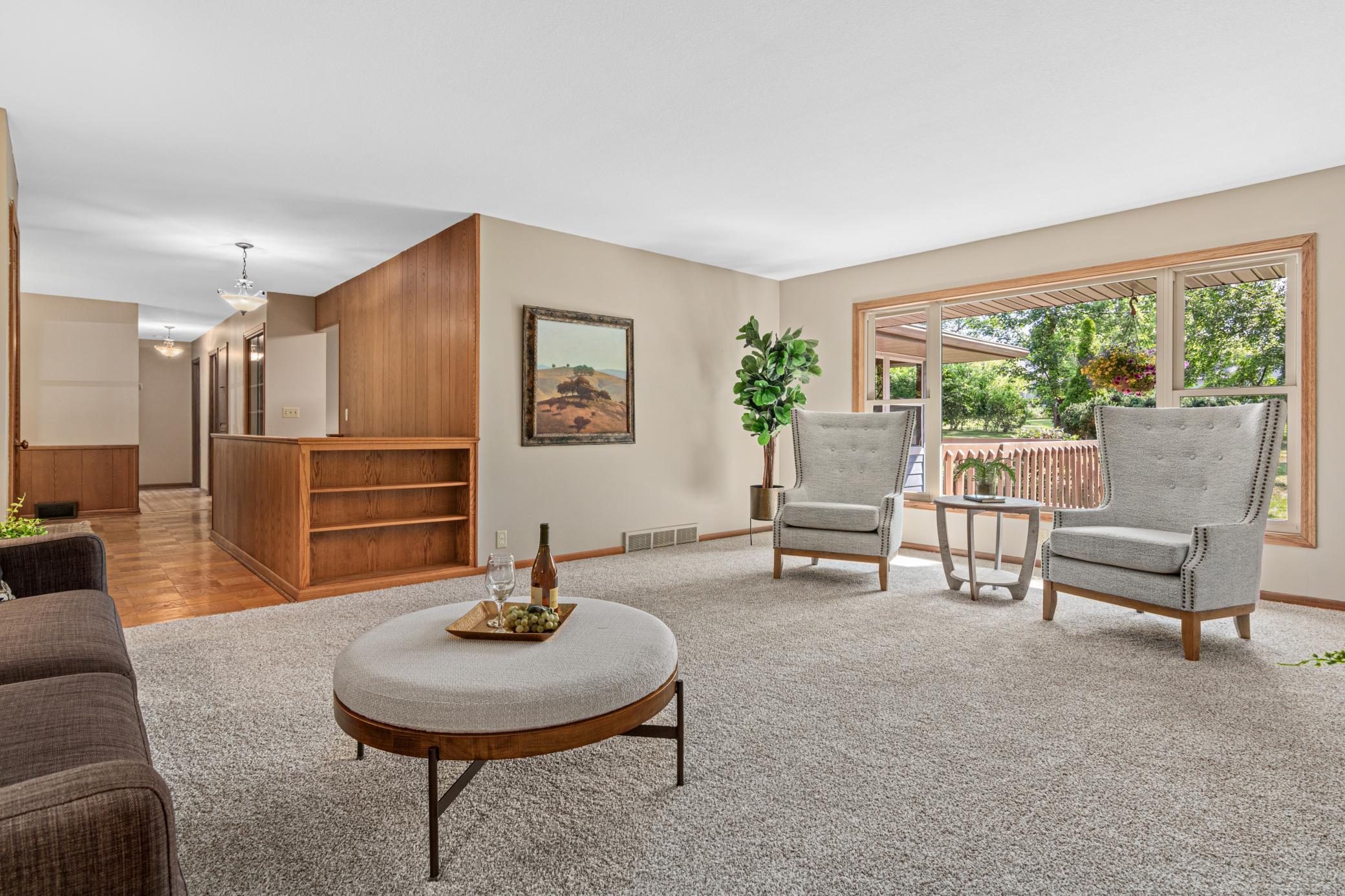 Spacious Living room with new carpet and paint