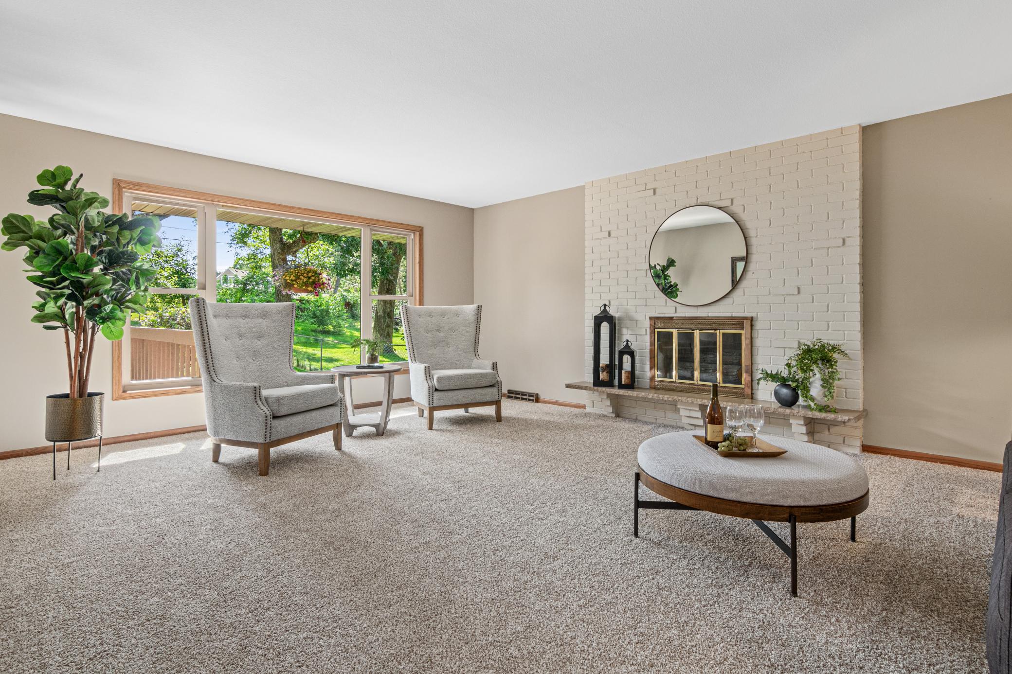 Spacious Living room with new carpet and paint