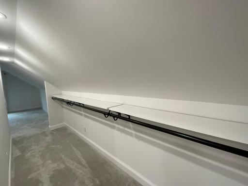 walk-thru closet in the upper level suite