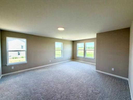 Owner's Bedroom with Sitting Area - 4633 Island Park Drive, Woodbury, MN 55129