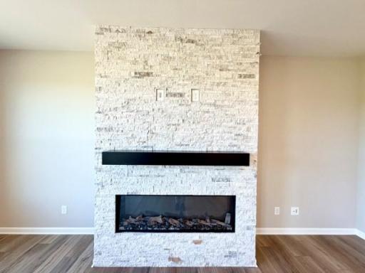Gathering Room Electric Fireplace with Natural Stone - 4633 Island Park Drive, Woodbury, MN 55129
