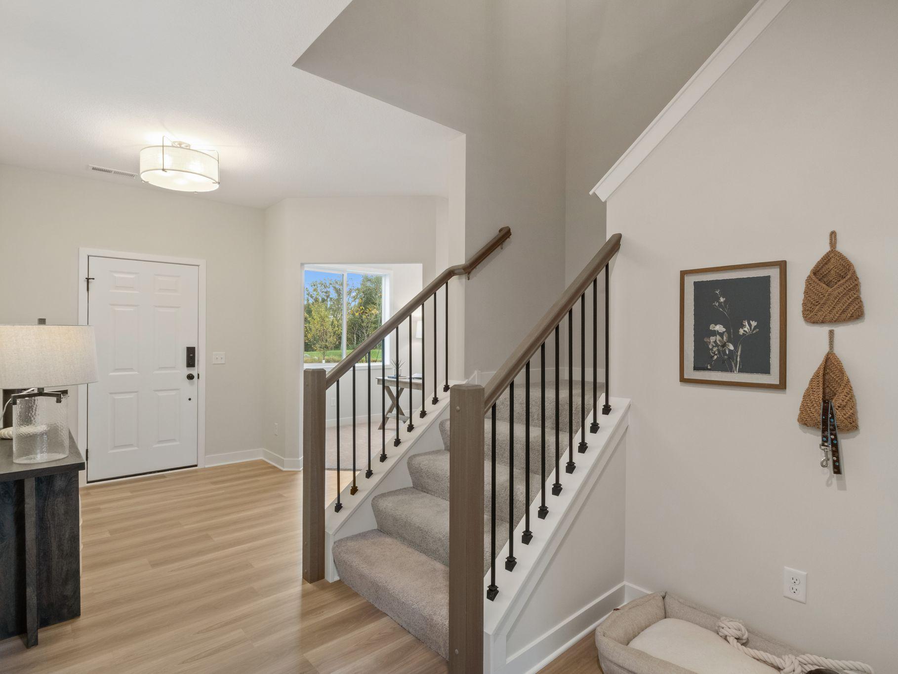 Front Entrance / Den / Stairs