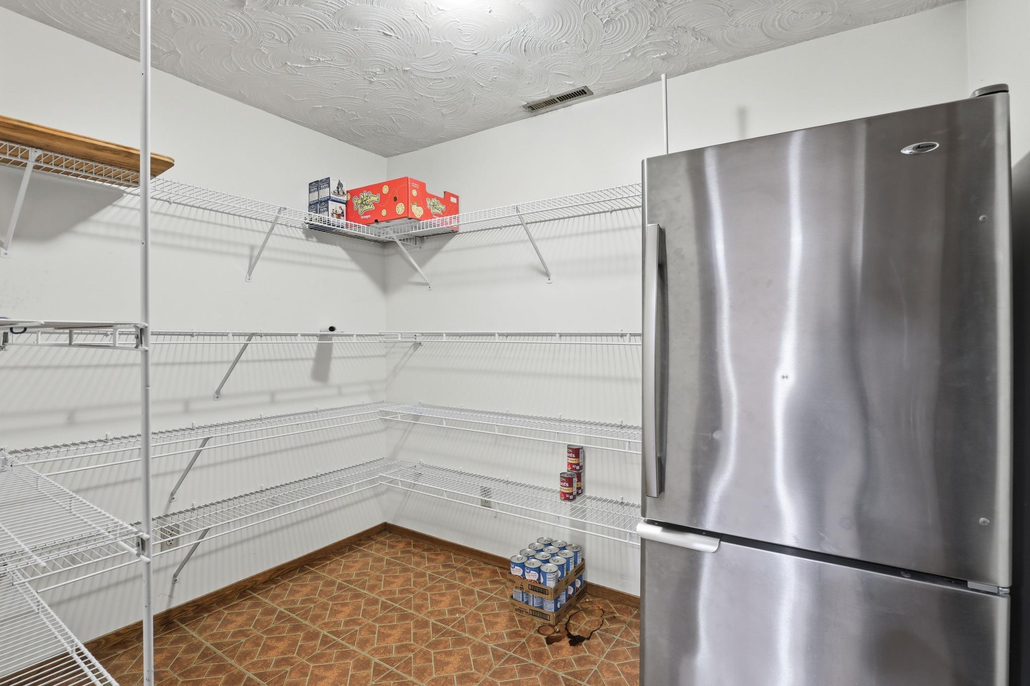 Storage room with second refrigerator