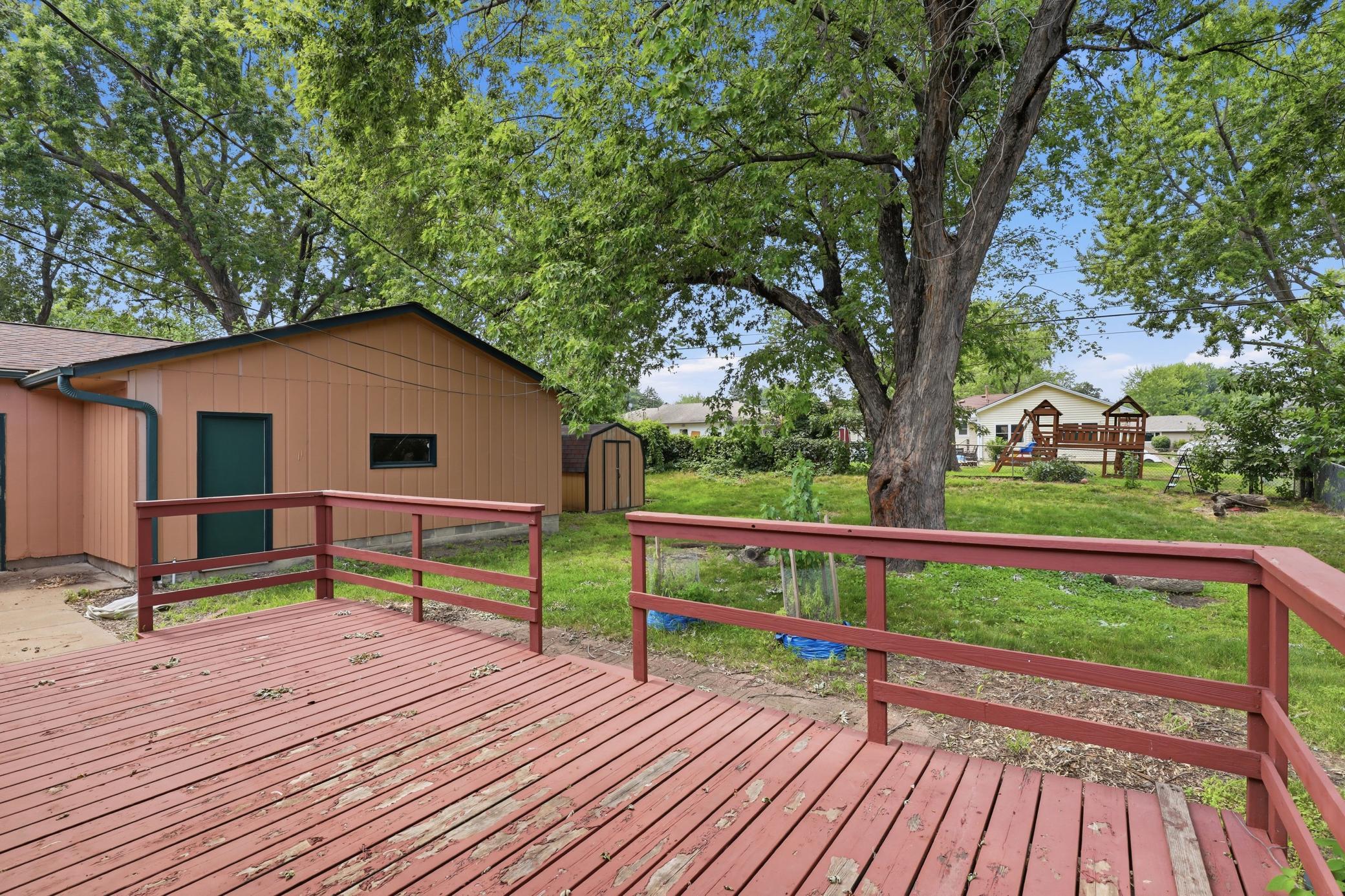 Views of the back yard. Large shop and storage shed