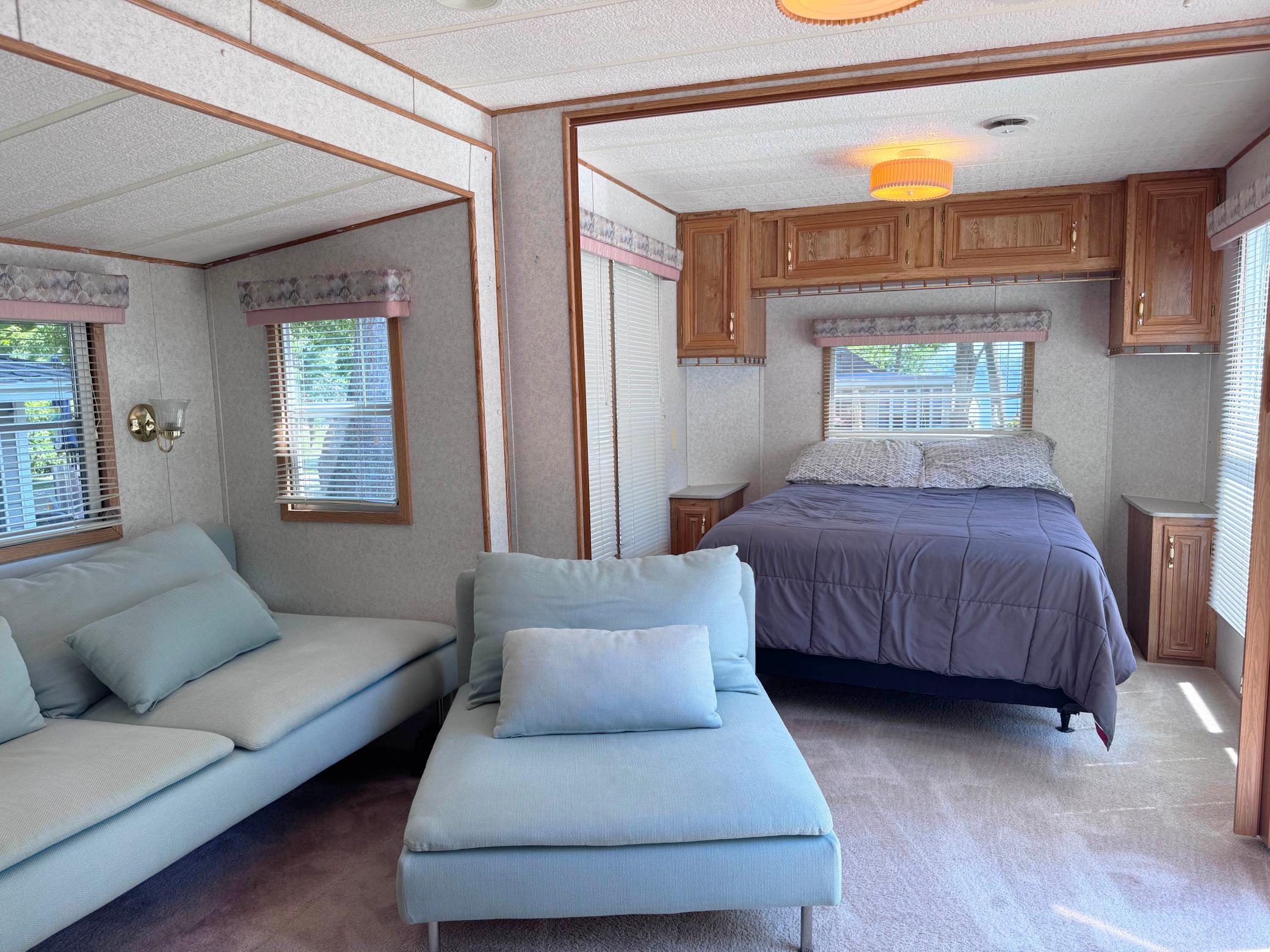Views from the living room to the back bedroom.
