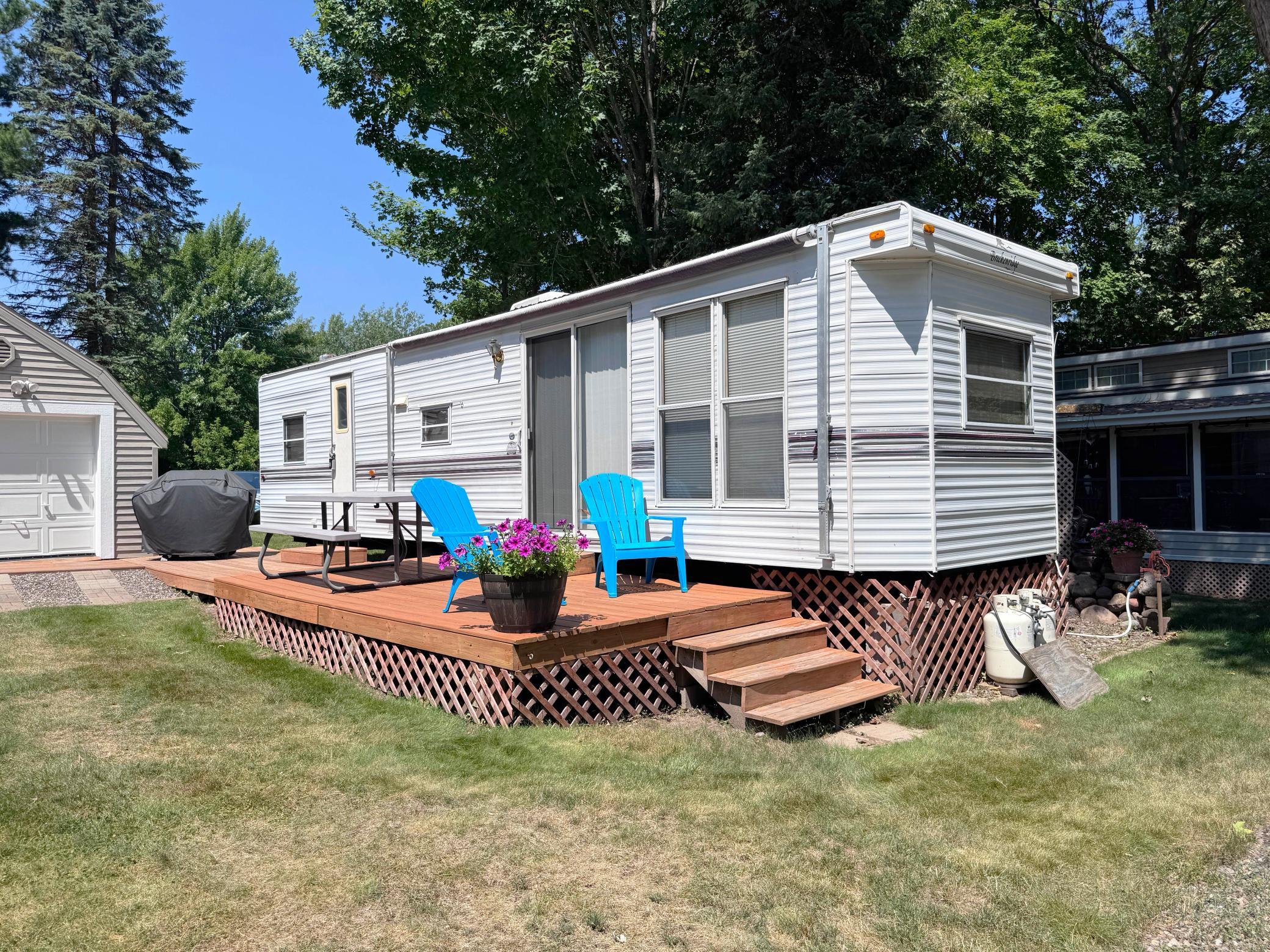 A shot of the camper and the deck.