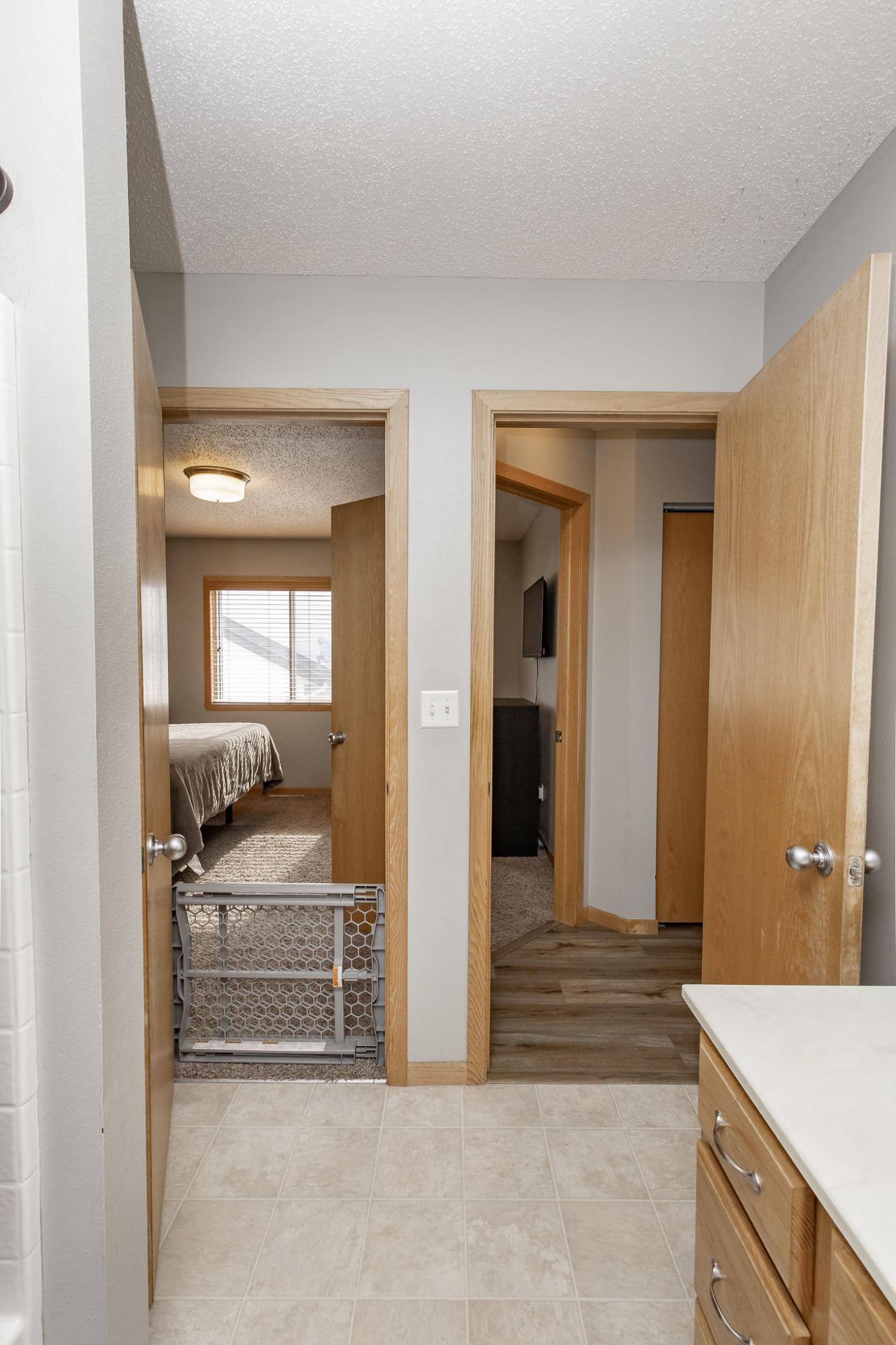 Opens to Bedroom + Hallway