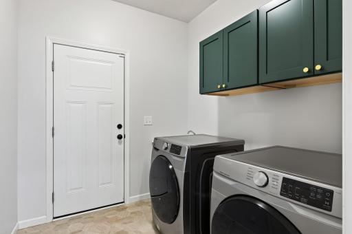 Mudroom/Laundry Area off the Kitchen is Secluded with a Pocket Door