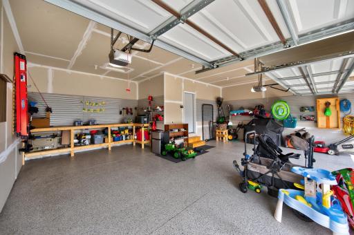 Three Car Garage with Epoxy Floors and Additional Storage