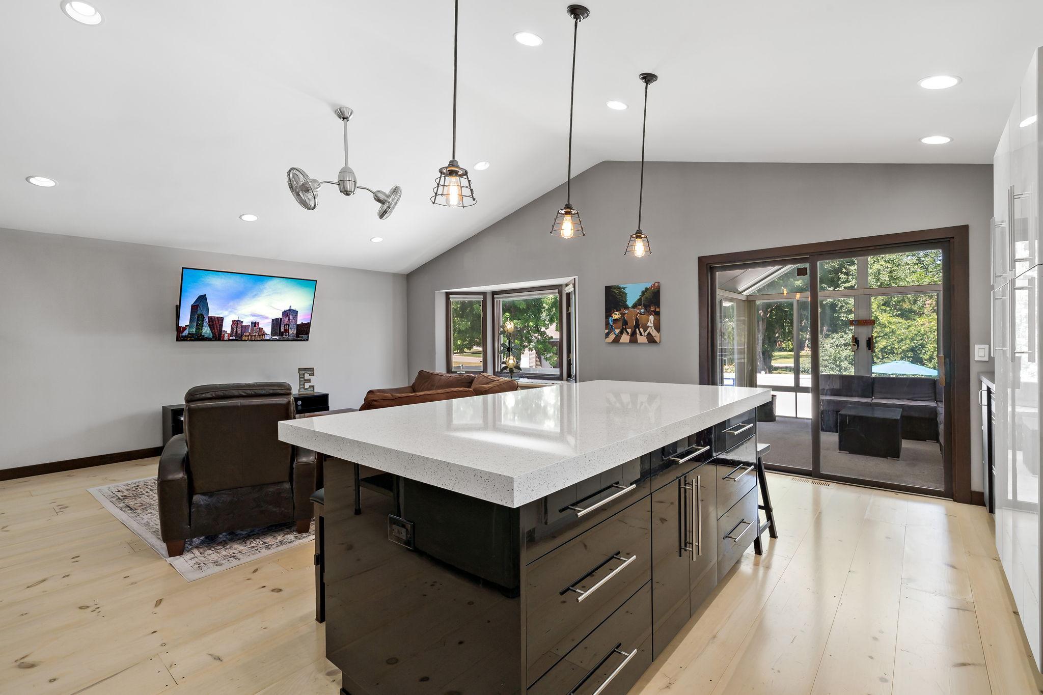 The island's extra drawer stacks make for a wonderful use of space