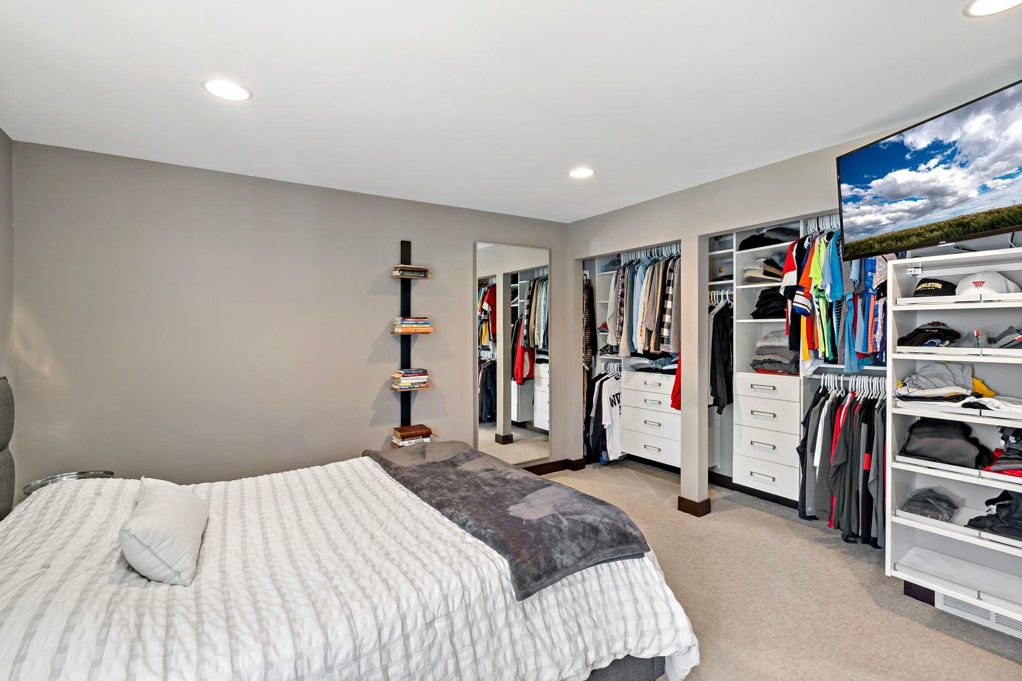 Custom closet system included in the primary bedroom