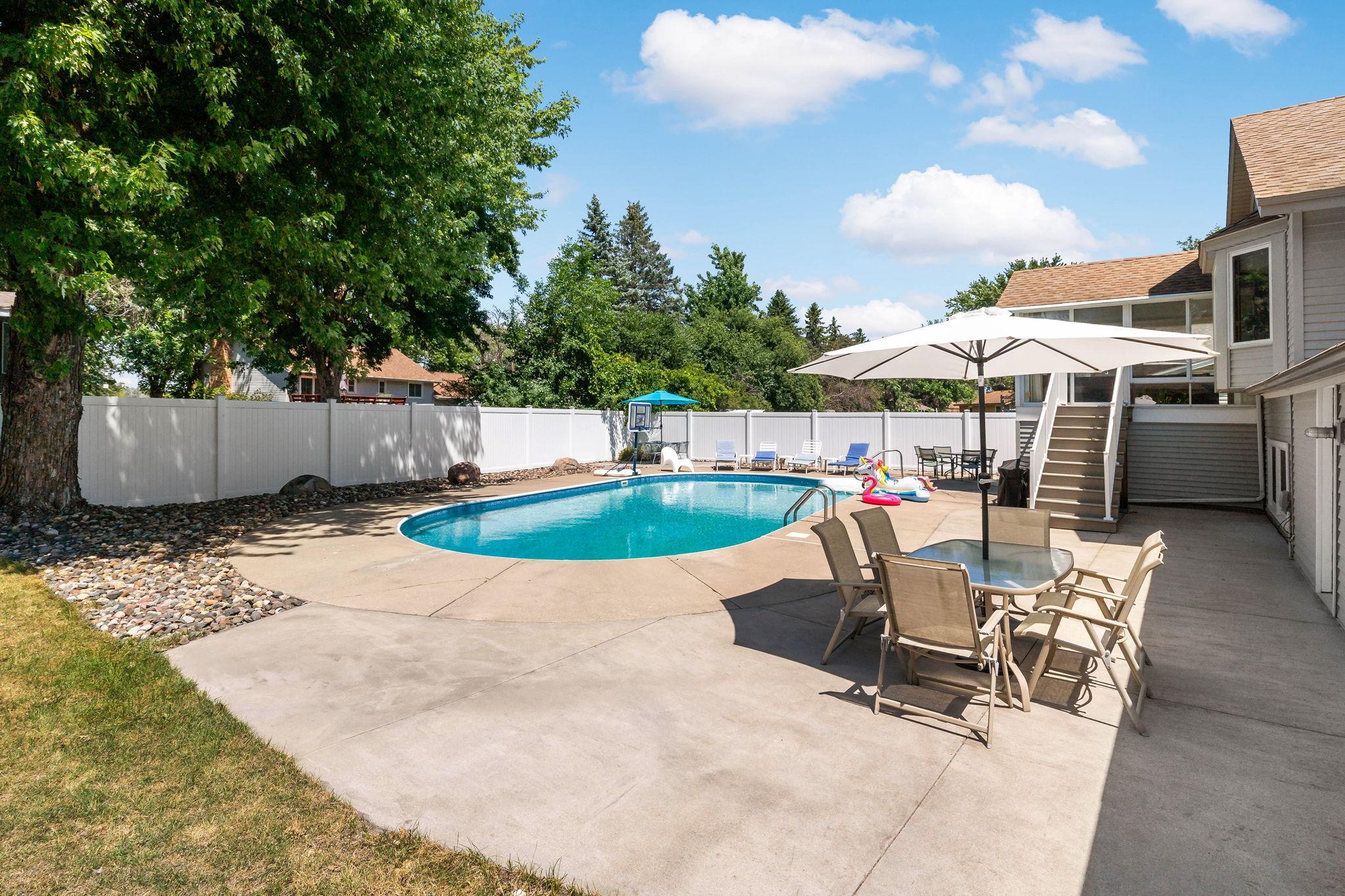 The entire left elevation of the house features a sodded side yard for any out of the water activity