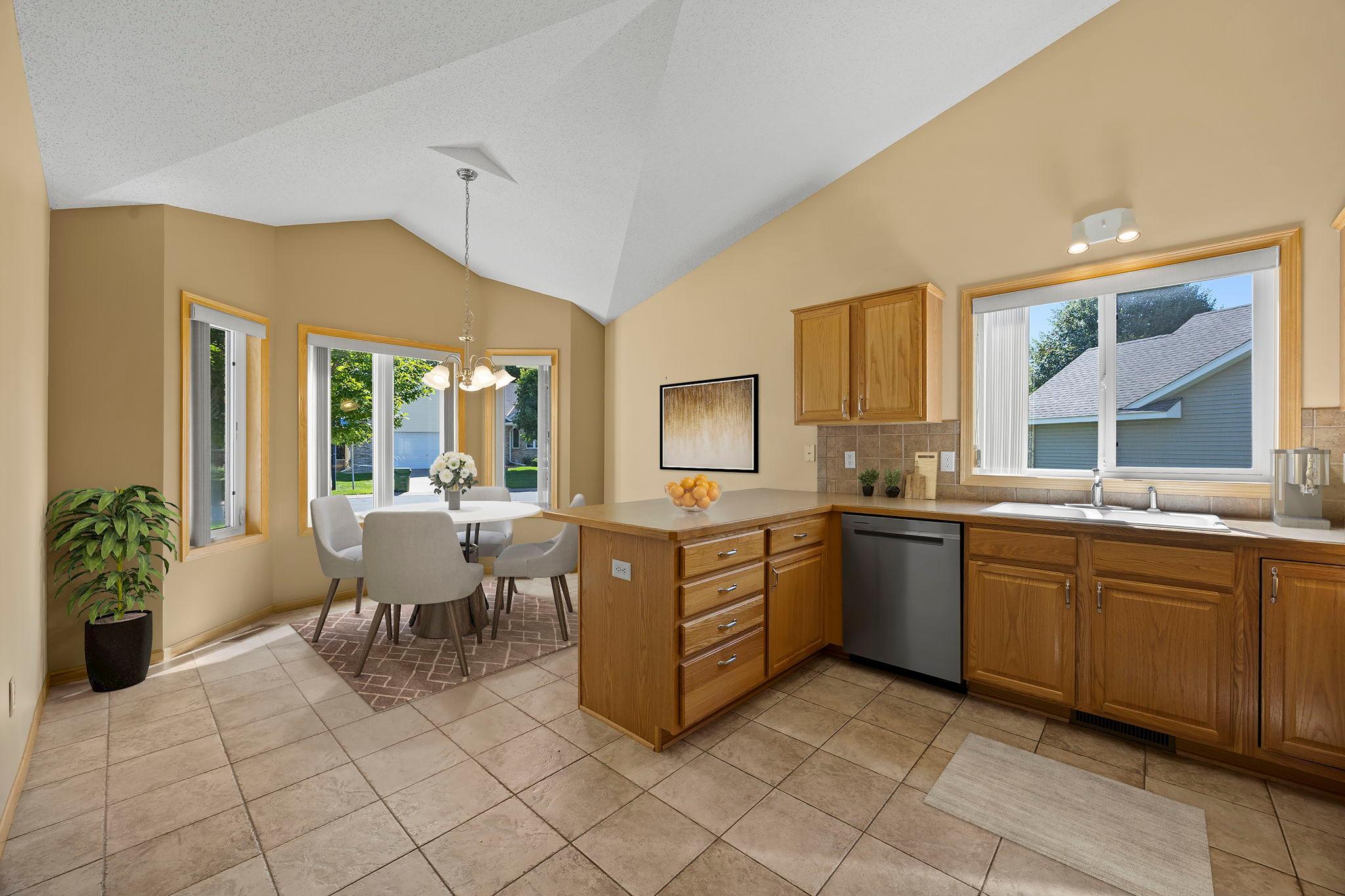 Virtually staged eat in kitchen
