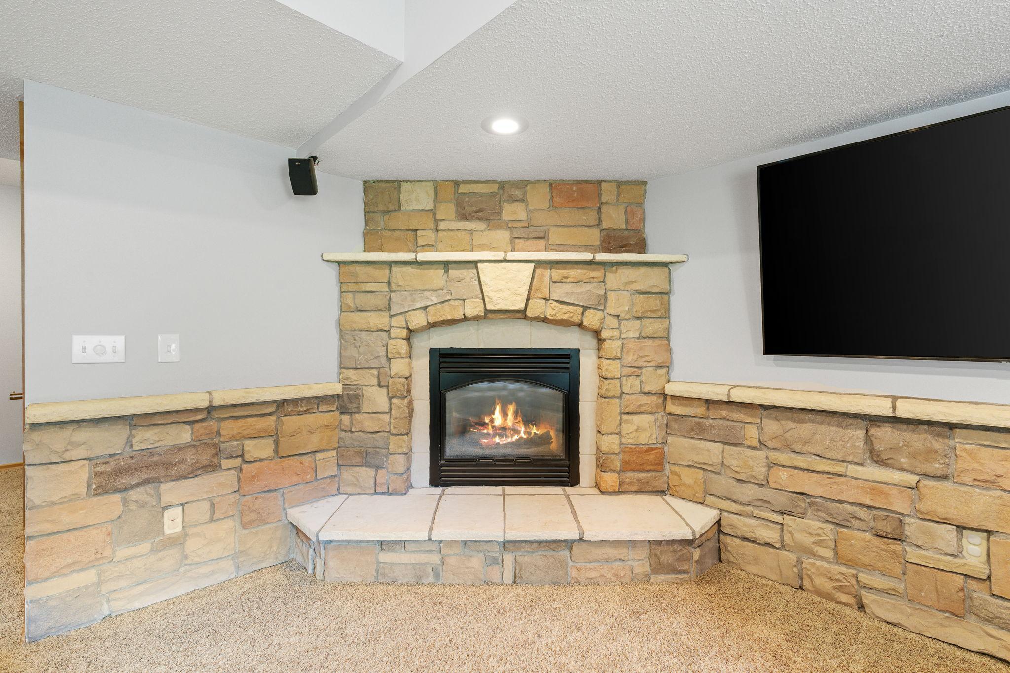 Custom stone, gas burning fireplace