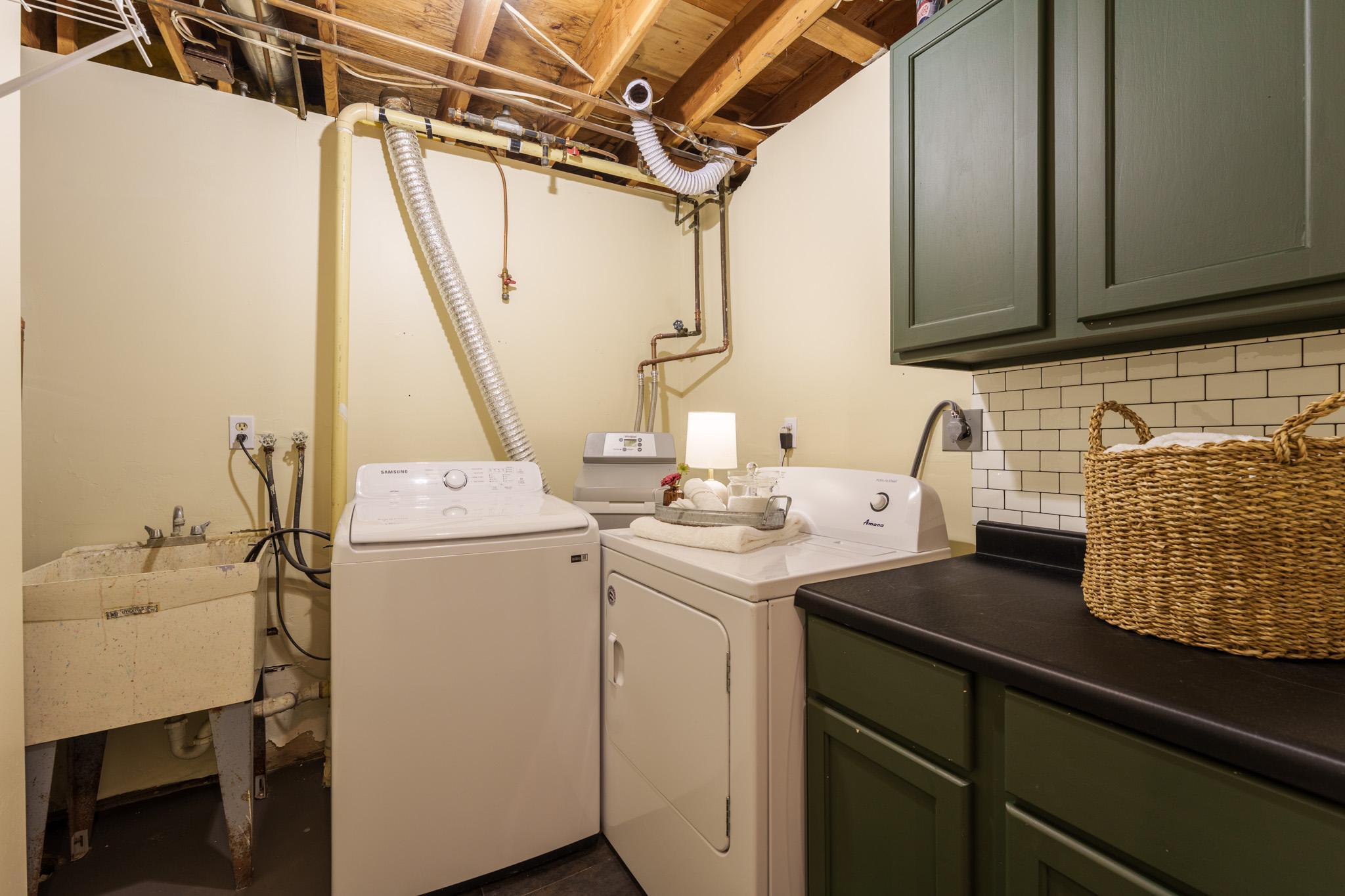 Laundry room on the lower level. Room dimensions are 8x7 ft.